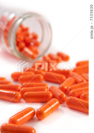 bunch of orange pills 7335630