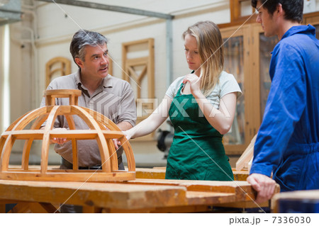 Teacher teaching a woodwork class Teacher teaching a woodwork class 7336030