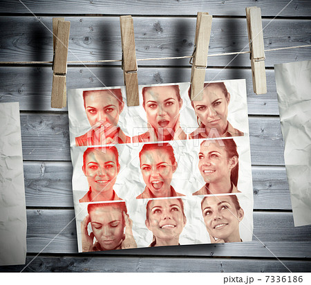 Pegs hanging pictures showing woman gesturing 7336186