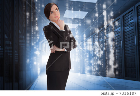 Businesswoman contemplating in data center Businesswoman contemplating in data center 7336187