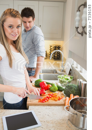 Couple in the kitchen with tablet computer Couple in the kitchen with tablet computer 7336193