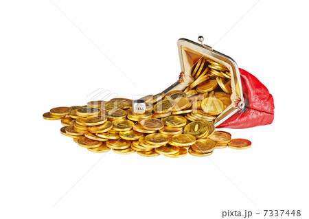 Scattered  gold coins are in  red purse, isolated on white backg 7337448