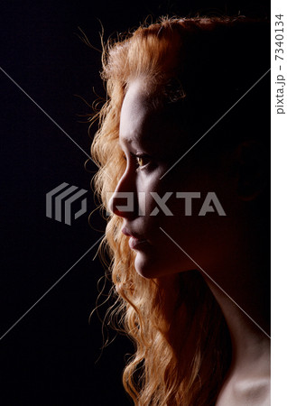 profile of young pensive woman 7340134