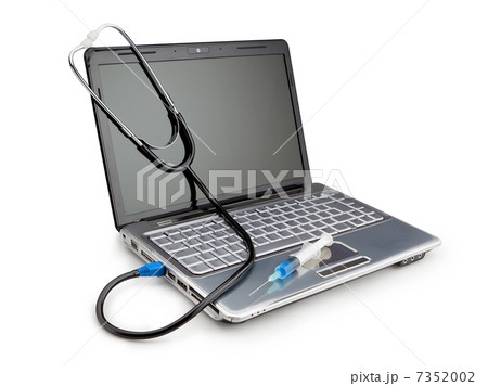 Modern laptop with a stethoscope and syringe for the treatment o 7352002