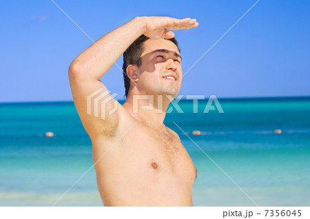 happy man on the beach happy man on the beach 7356045