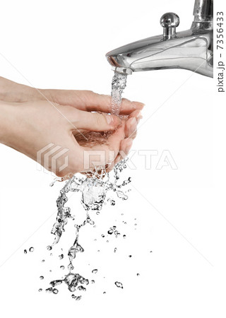 hands with pouring water isolated on white hands with pouring water isolated on white 7356433