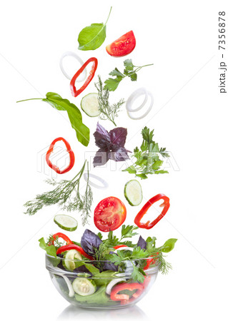 Falling vegetables for salad isolated on white 7356878