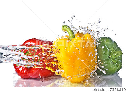 red, yellow and green pepper with water splash isolated on white red, yellow and green pepper with water splash isolated on white 7358810
