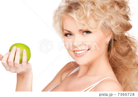 young beautiful woman with green apple 7360728