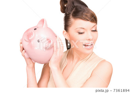 lovely woman with piggy bank lovely woman with piggy bank 7361894