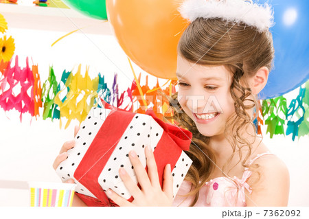 party girl with balloons and gift box 7362092