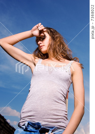 young sexy woman in blue jeans 7368022