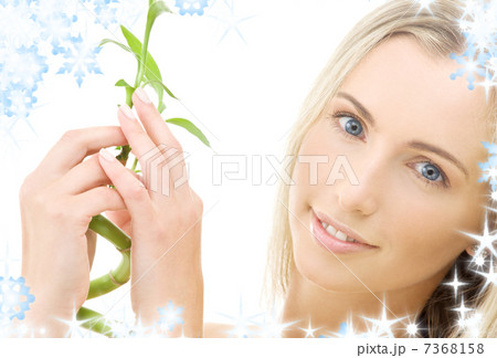 happy blonde with bamboo happy blonde with bamboo 7368158