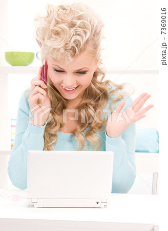 lovely woman with cell phone and computer 7369016