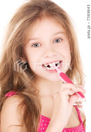happy girl with toothbrush 7369643