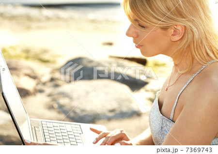 outdoor picture of blond with laptop outdoor picture of blond with laptop 7369743