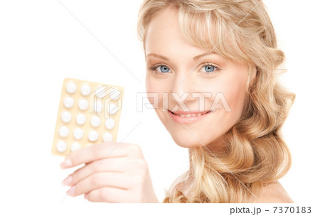 young woman with pills 7370183