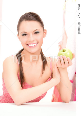 young beautiful woman with green apple 7371438