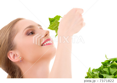 happy woman with spinach 7371822