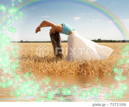 stretching woman with rainbow, water and flowers stretching woman with rainbow, water and flowers 7372109