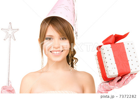 teenage party girl with magic wand and gift box teenage party girl with magic wand and gift box 7372282