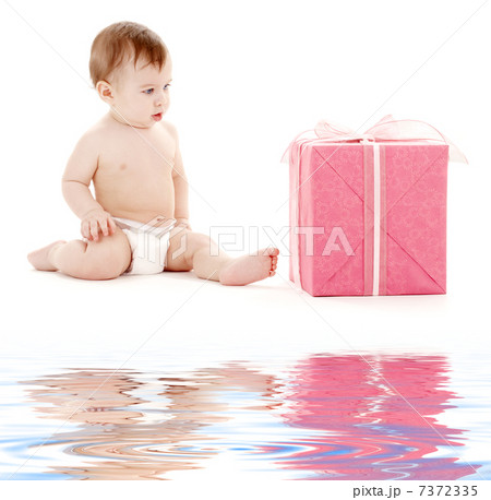 baby boy in diaper with big gift box 7372335