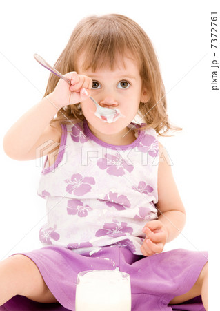 little girl with yogurt 7372761