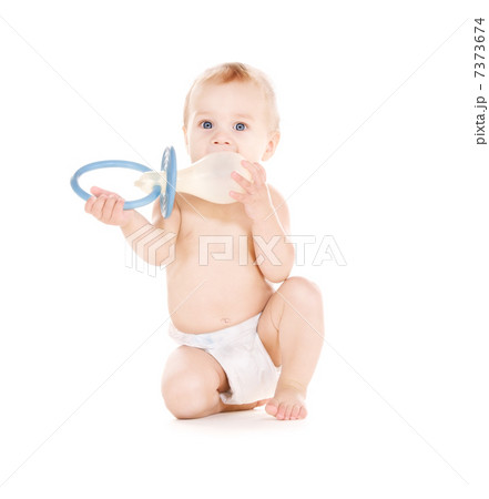 baby boy with big pacifier 7373674