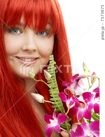 lovely redhead with orchid 7373675