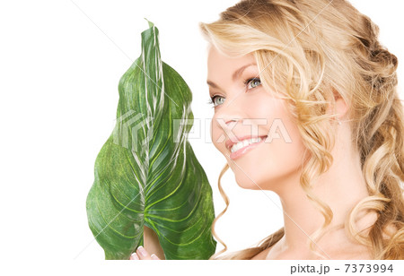woman with green leaf 7373994