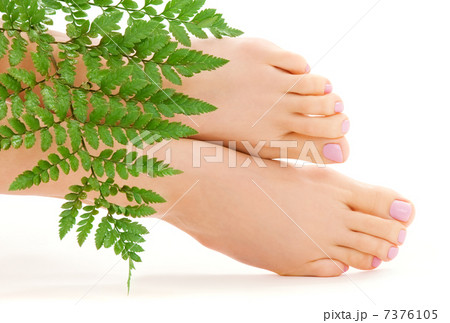 female feet with green leaf 7376105