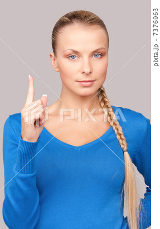 woman with her finger up woman with her finger up 7376963