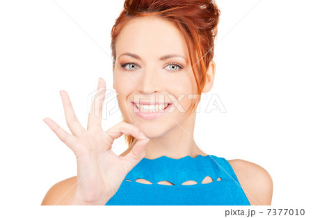 lovely redhead showing ok sign 7377010