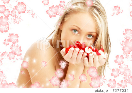 lovely blond with red and white rose petals and rendered flowers lovely blond with red and white rose petals and rendered flowers 7377034