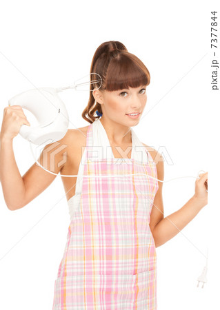 housewife with mixer 7377844