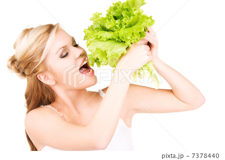happy woman with lettuce 7378440