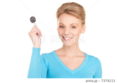 happy woman with car key 7379213