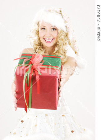 cheerful santa helper girl with gift box 7380173