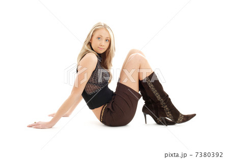 sitting blond in brown shorts and boots #2 7380392