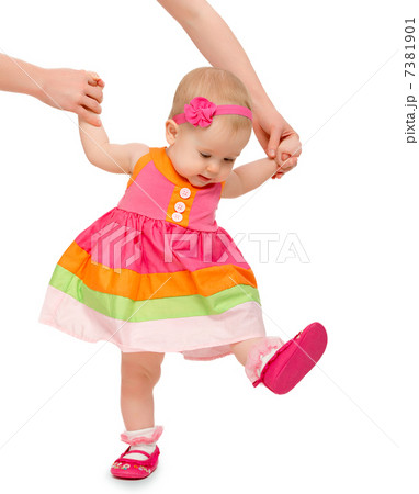 first steps of a beautiful cute baby girl with hand of mother i first steps of a beautiful cute baby girl with hand of mother i 7381901