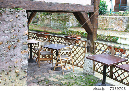 Sidewalk cafe tables in the winter. Chartres. France 7389708