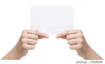two female teen hands holding paper sheet two female teen hands holding paper sheet 7389889
