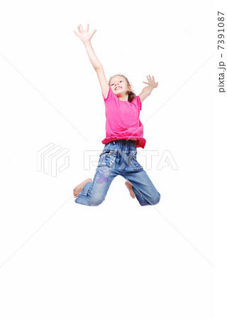 Happy cute girl in white clothes is jumping isolated Happy cute girl in white clothes is jumping isolated 7391087