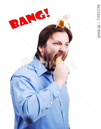 Young man blowing up his brain with banana Young man blowing up his brain with banana 7391156