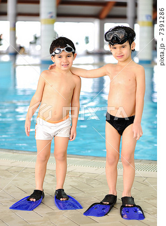 Activities at the pool, children swimming and playing in water, happiness and summertime Activities at the pool, children swimming and playing in water, happiness and summertime 7391286