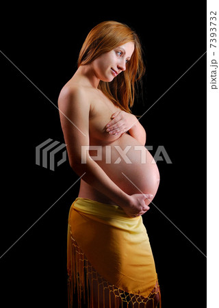 pregnant woman isolated on black pregnant woman isolated on black 7393732