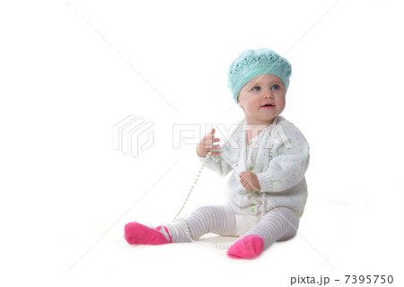 baby girl with pearl necklace 7395750