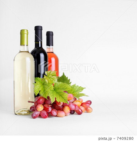 bottles of wine and grapes bottles of wine and grapes 7409280
