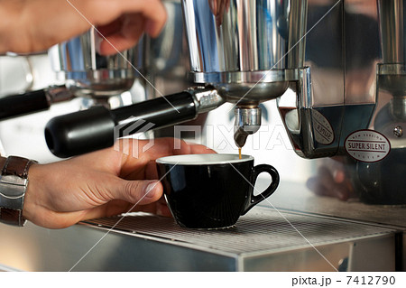 Barista prepares cappuccino Barista prepares cappuccino 7412790