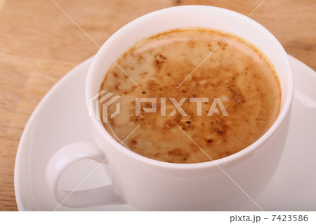 cup of cappuccino with foam 7423586